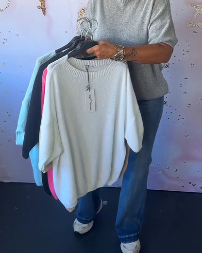 Casual, relaxed jumper with a round neckline and plain colour