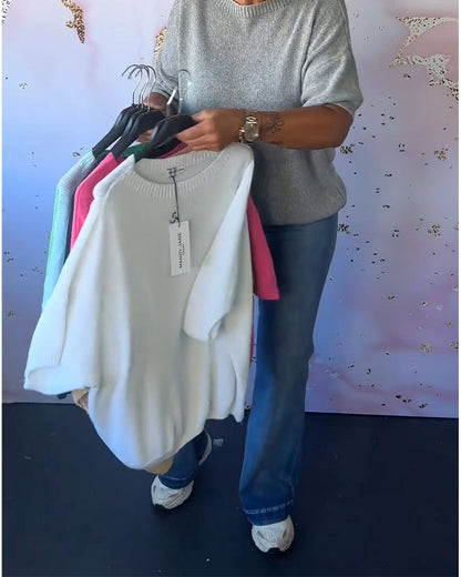 Casual, relaxed jumper with a round neckline and plain colour